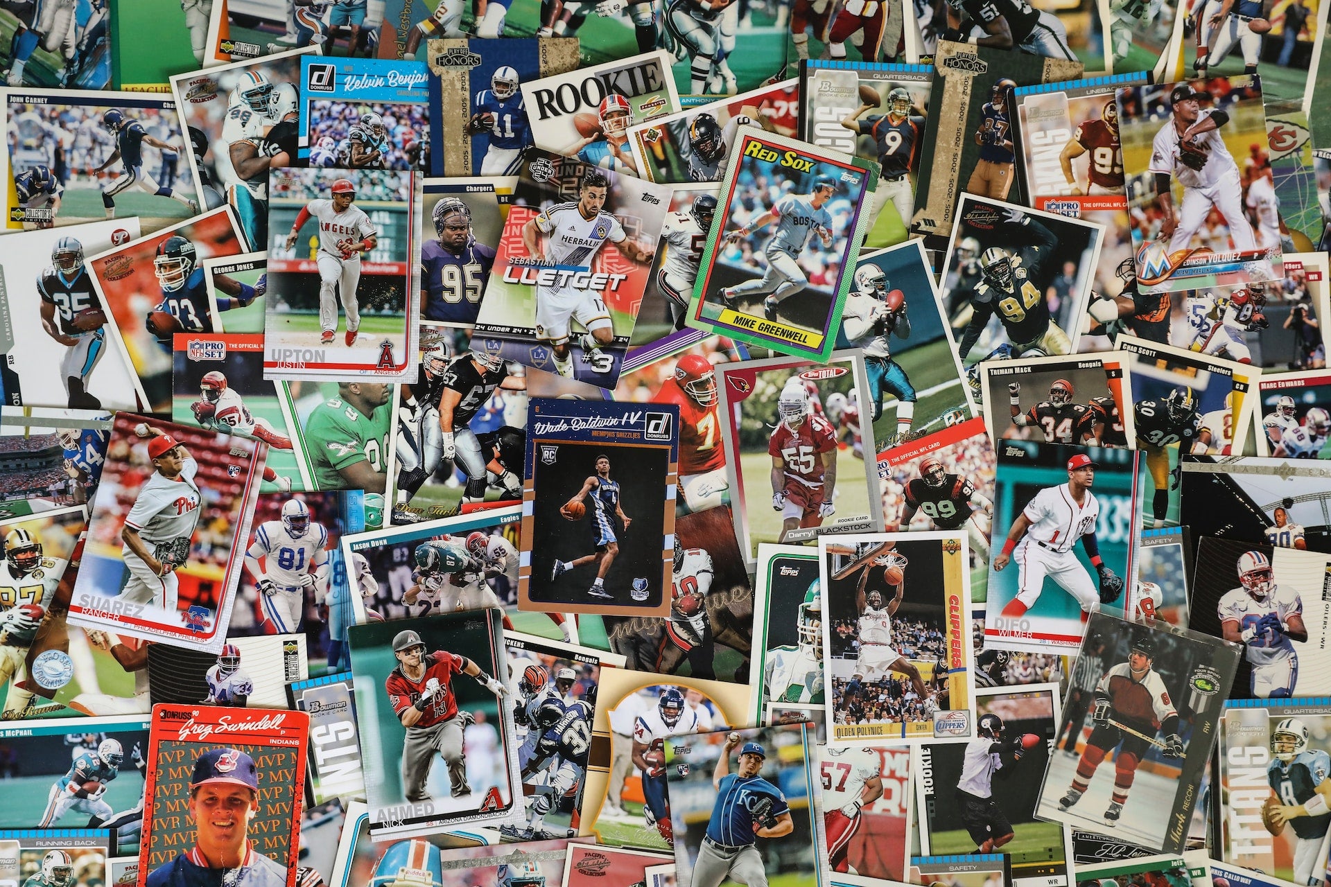assorted sports cards scattered