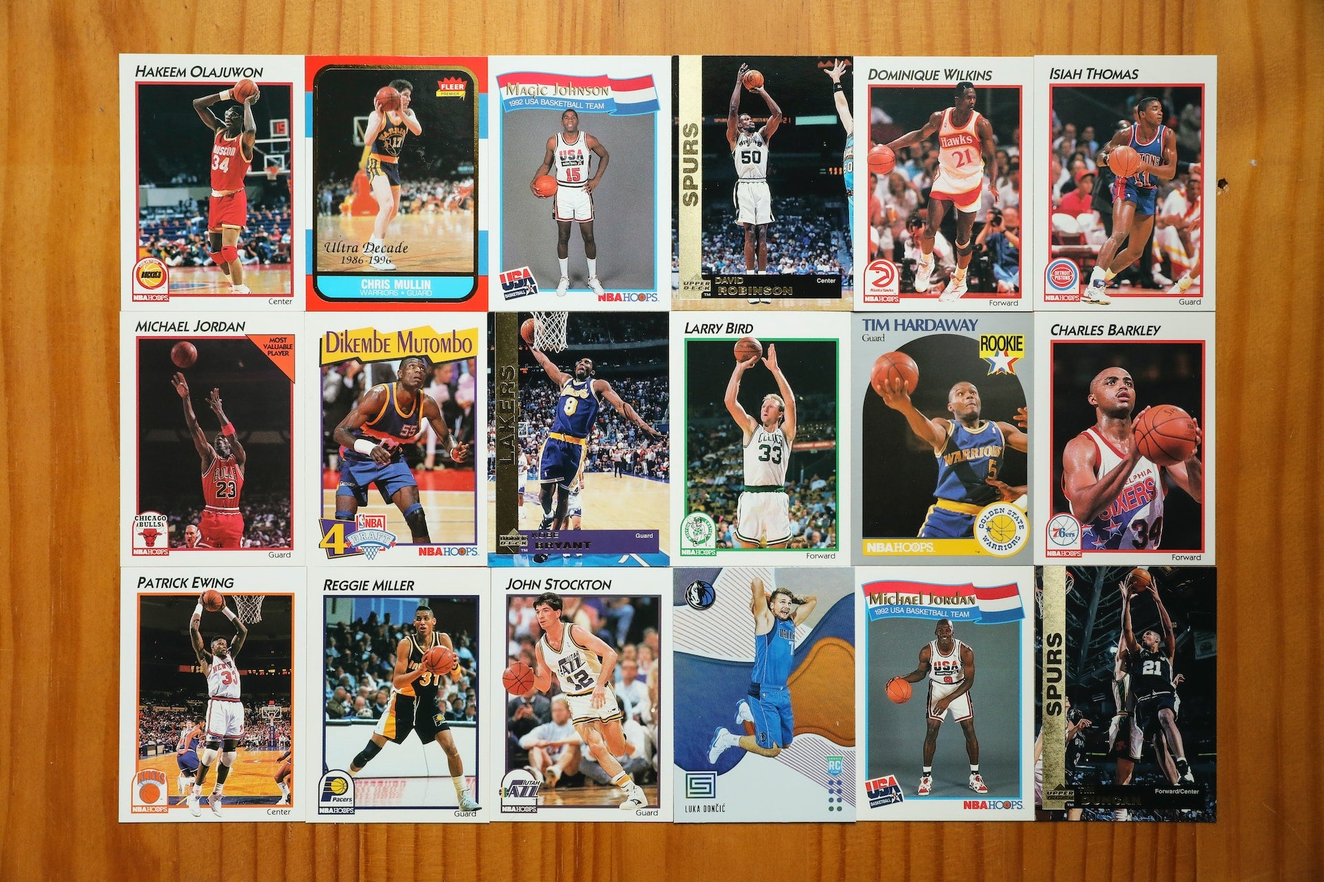 A selection of collectible basketball cards lined up