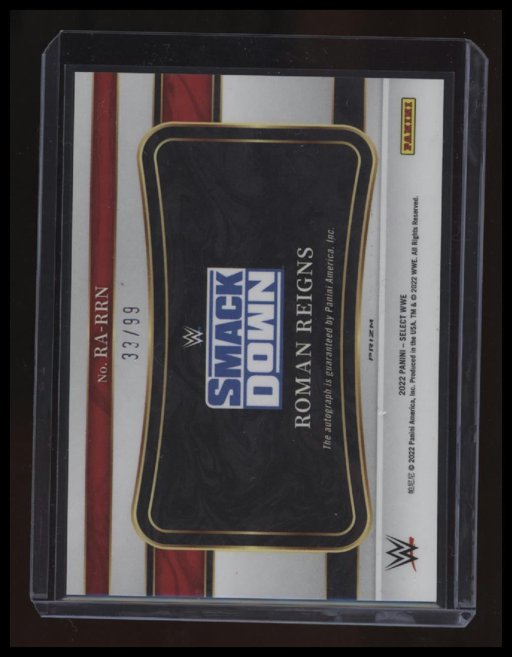 2022 Panini Select WWE Roman Reigns Ringside Action Signatures Red Prizms #/99